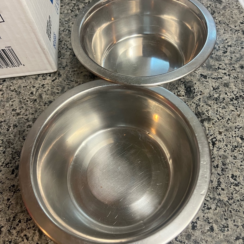 Two small dogs bowls perfect for a small dog or cat